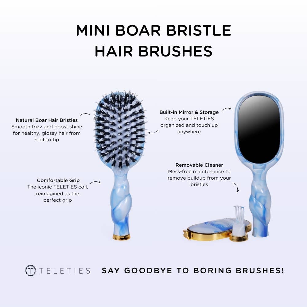 Mini Boar Brush by TELETIES featuring natural boar bristles and a compact design for gentle hair grooming.
