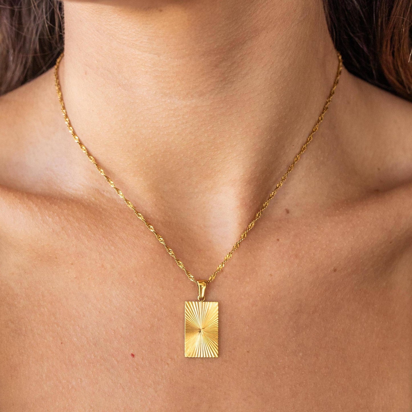 Gold 30A necklace by ALCO Jewelry featuring a sleek, elegant chain design on a white background.