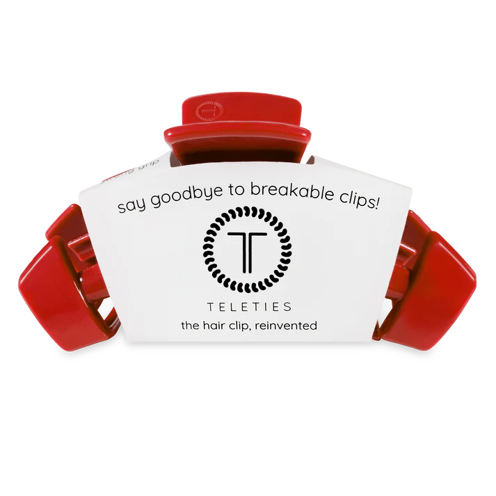 Red TELETIES large claw hair clip, classic red color, stylish and functional for securing hair in a sleek, elegant style.