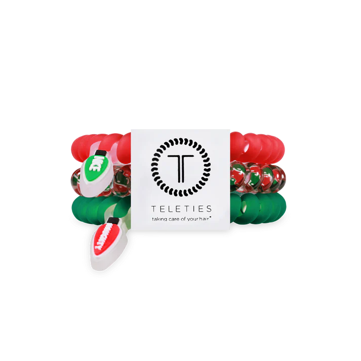 Naughty or Nice small TELETIES hair ties with festive red and green colors, perfect for securing hair in a stylish, fun way.