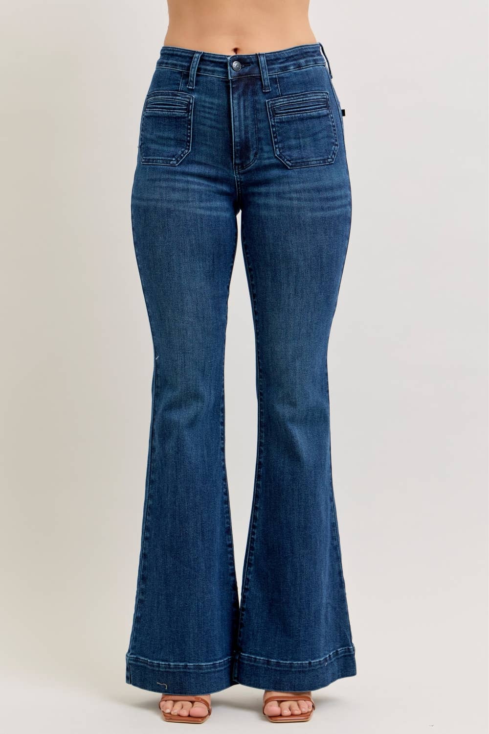Vintage Judy Blue Jeans pocket flare jeans with distressed details and classic fit, shown in a natural side view.