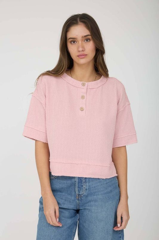 Pink Good Day Tee by Blu Pepper featuring a relaxed fit and casual style, displayed on a wooden hanger.