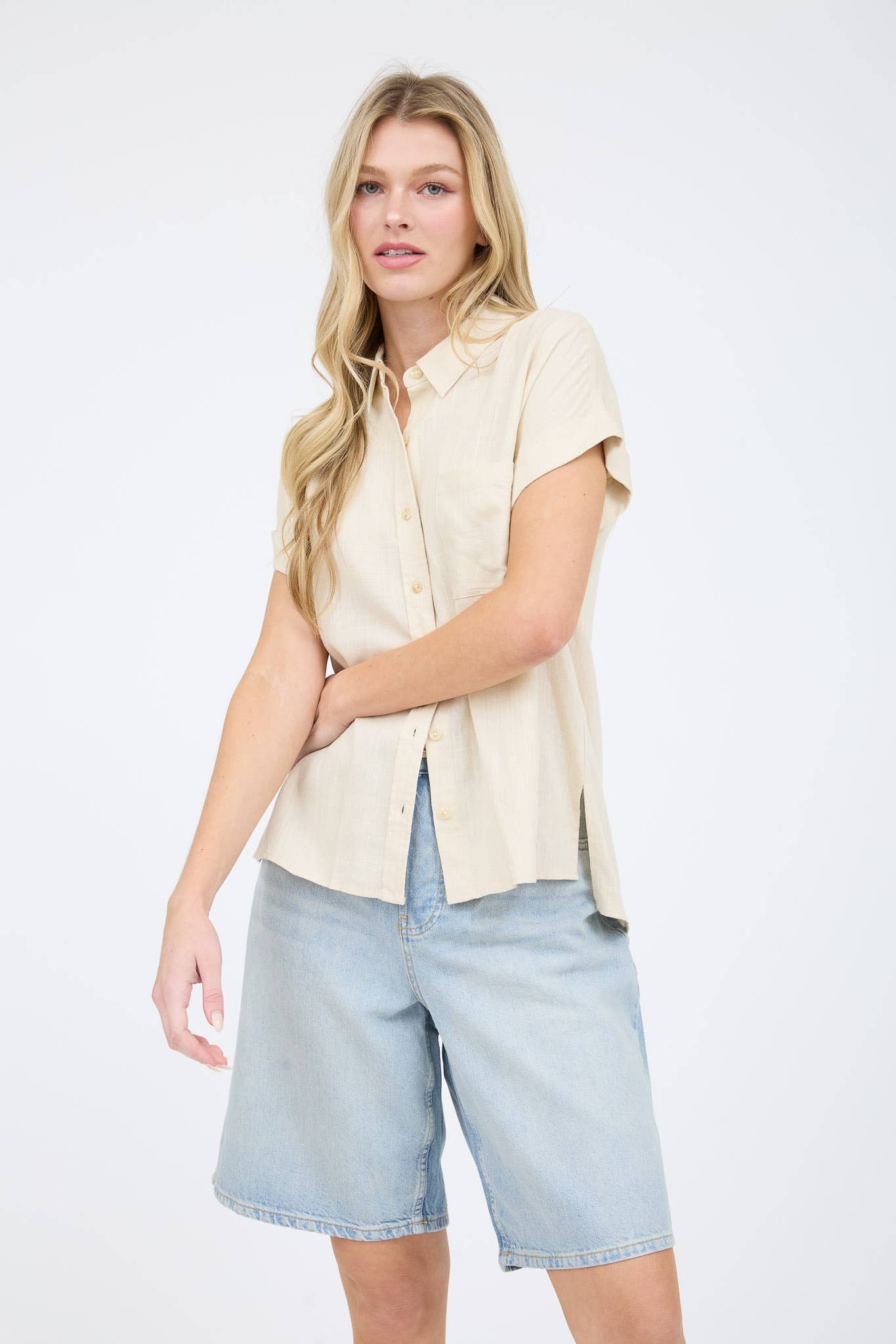 Luverne Collared Top from Can't Hide Pretty Boutique, featuring a stylish collar and fitted design, shown in a close-up view.