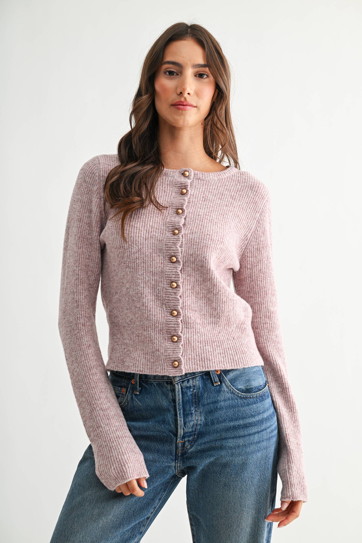 Camellia Certain Someone cardigan in soft knit fabric, featuring a relaxed fit and button-up front, worn styled with casual accessories.