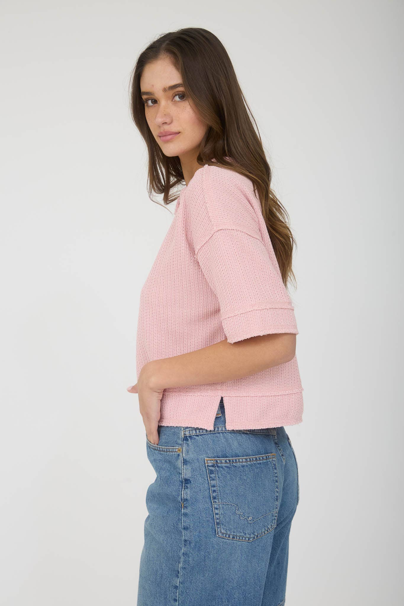 Blu Pepper raw edge henley short sleeve waffle knit top with a textured fabric and casual fit.