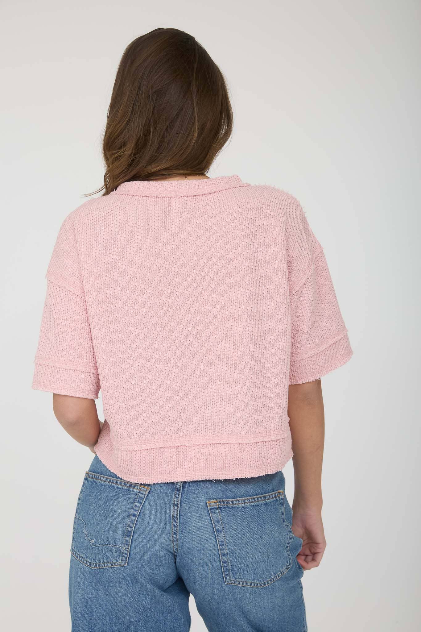 Blu Pepper raw edge henley short sleeve waffle knit top displayed on a model, featuring a relaxed fit and textured fabric.