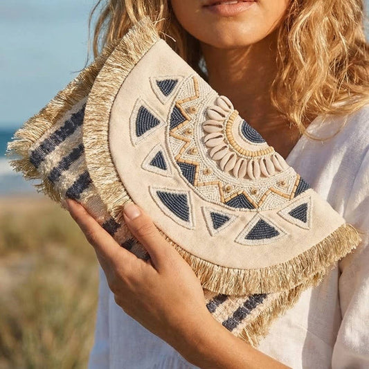 Beaded clutch bag from Can't Hide Pretty Boutique with intricate beadwork and compact design for evening use