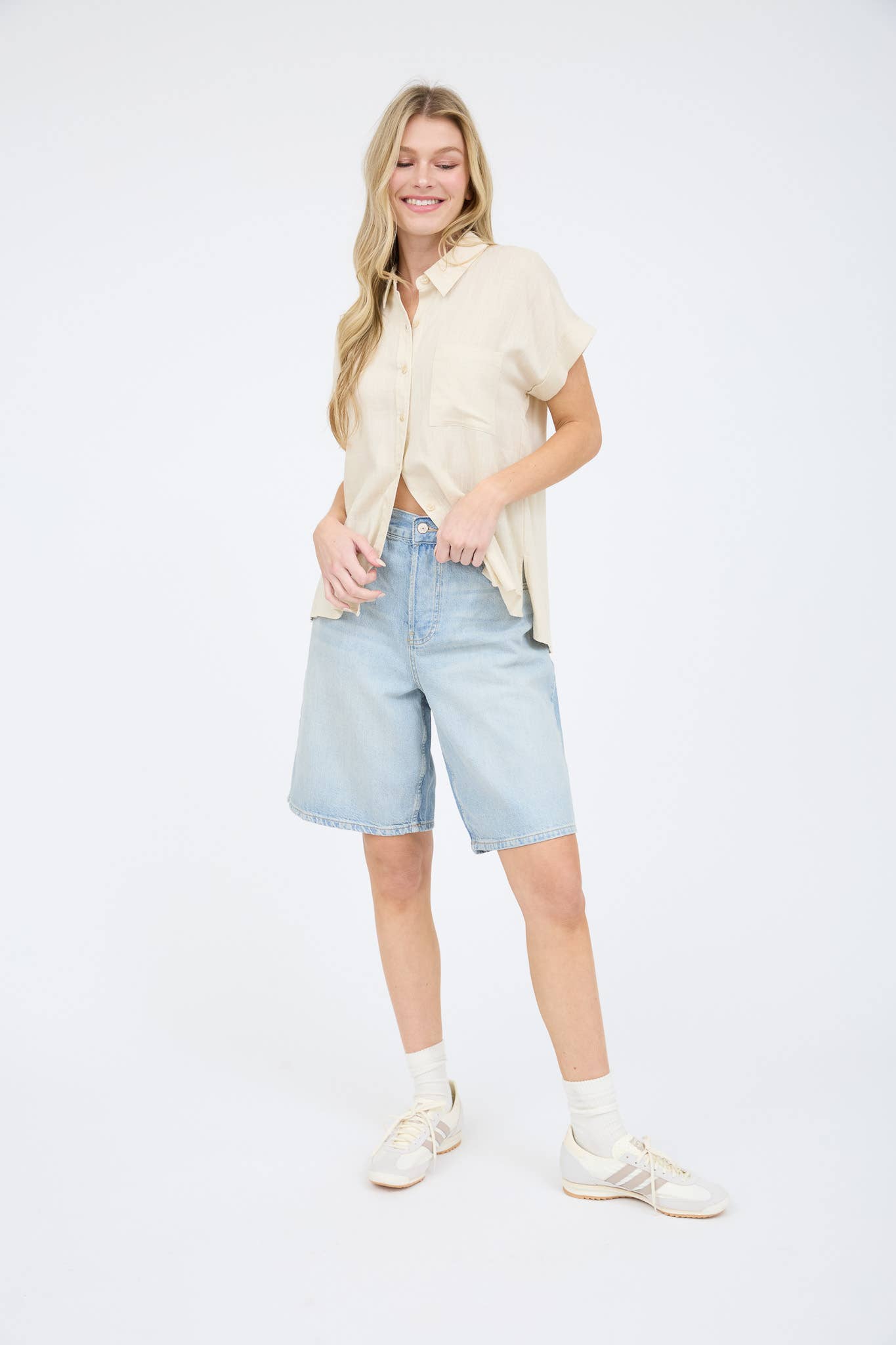 Luverne collared top from Can't Hide Pretty Boutique, featuring a stylish collar and lightweight fabric, displayed on a hanger.