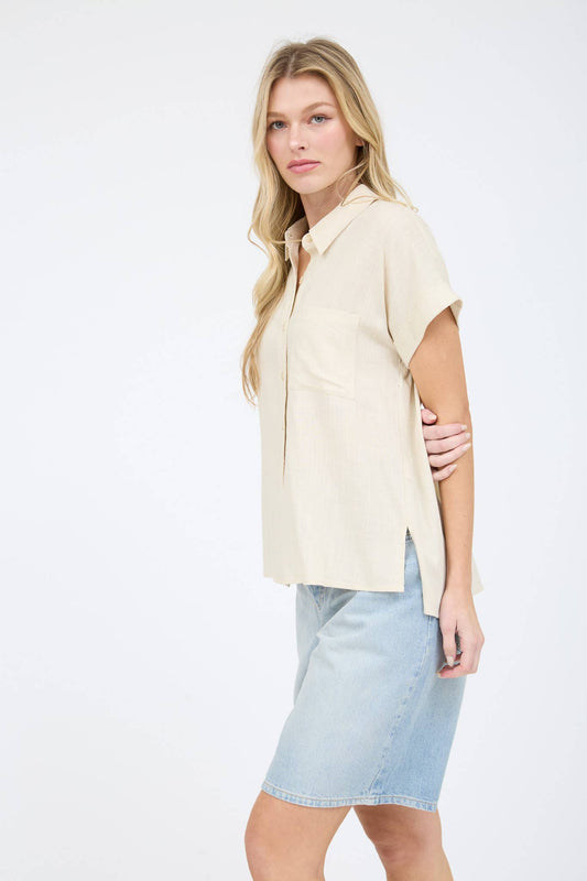 Luverne Collared Top from Can't Hide Pretty Boutique, featuring a stylish collar and soft fabric, displayed on a hanger.