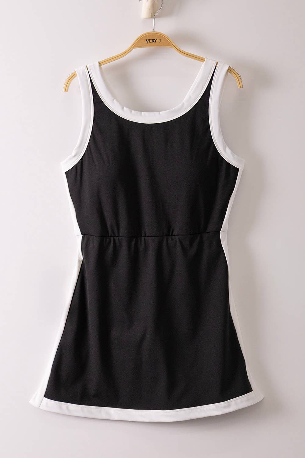 Sporty Spice athletic dress by VERY J featuring a fitted design, sleeveless style, and vibrant color, perfect for activewear.